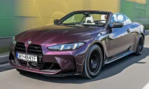 Fioletowe BMW M4 Cabrio na drodze. Sprawdź aktualną bmw m4 cena i poczuj wolność jazdy.