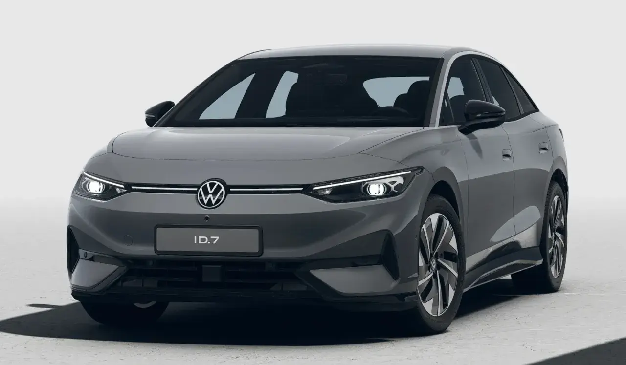 Szary Volkswagen ID.7 z nowoczesnymi światłami LED i charakterystycznym grillem.