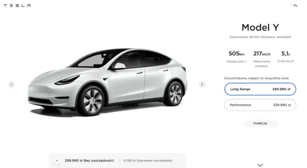 Biały Tesla Model Y Long Range, którego cena to 299.990 zł, z zasięgiem 505 km.